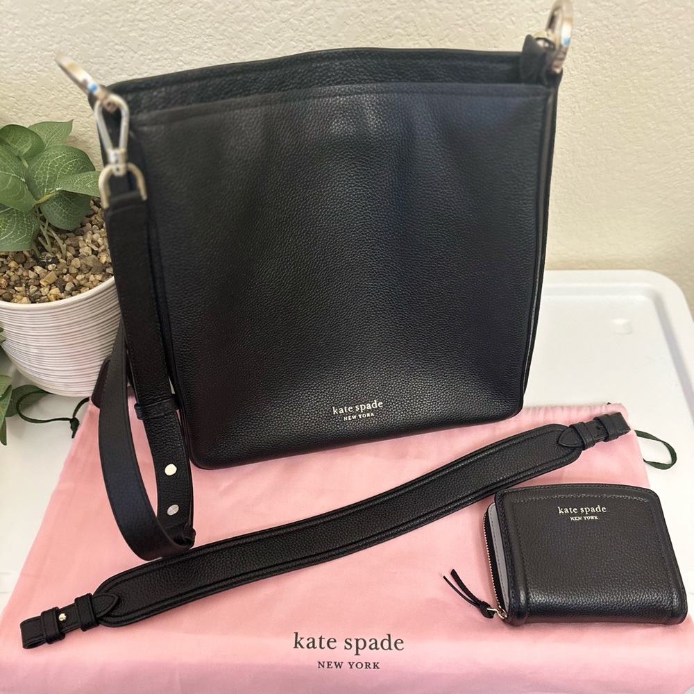 Like new Kate spade black leather purse/messenger bag with matching wallet.